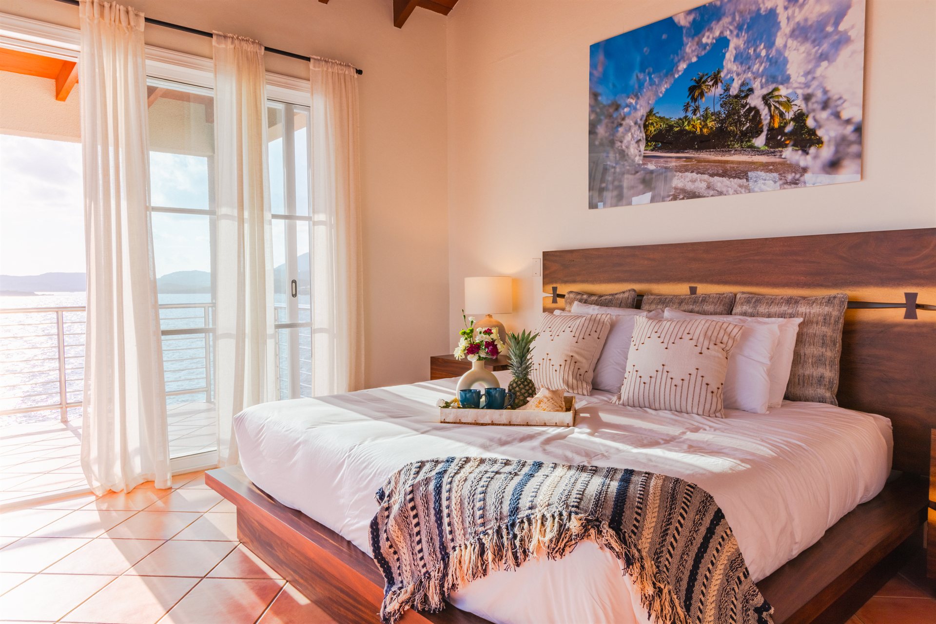 Master king suite with ocean view and designer linens at Ocean Pointe Caribe, St Thomas USVI