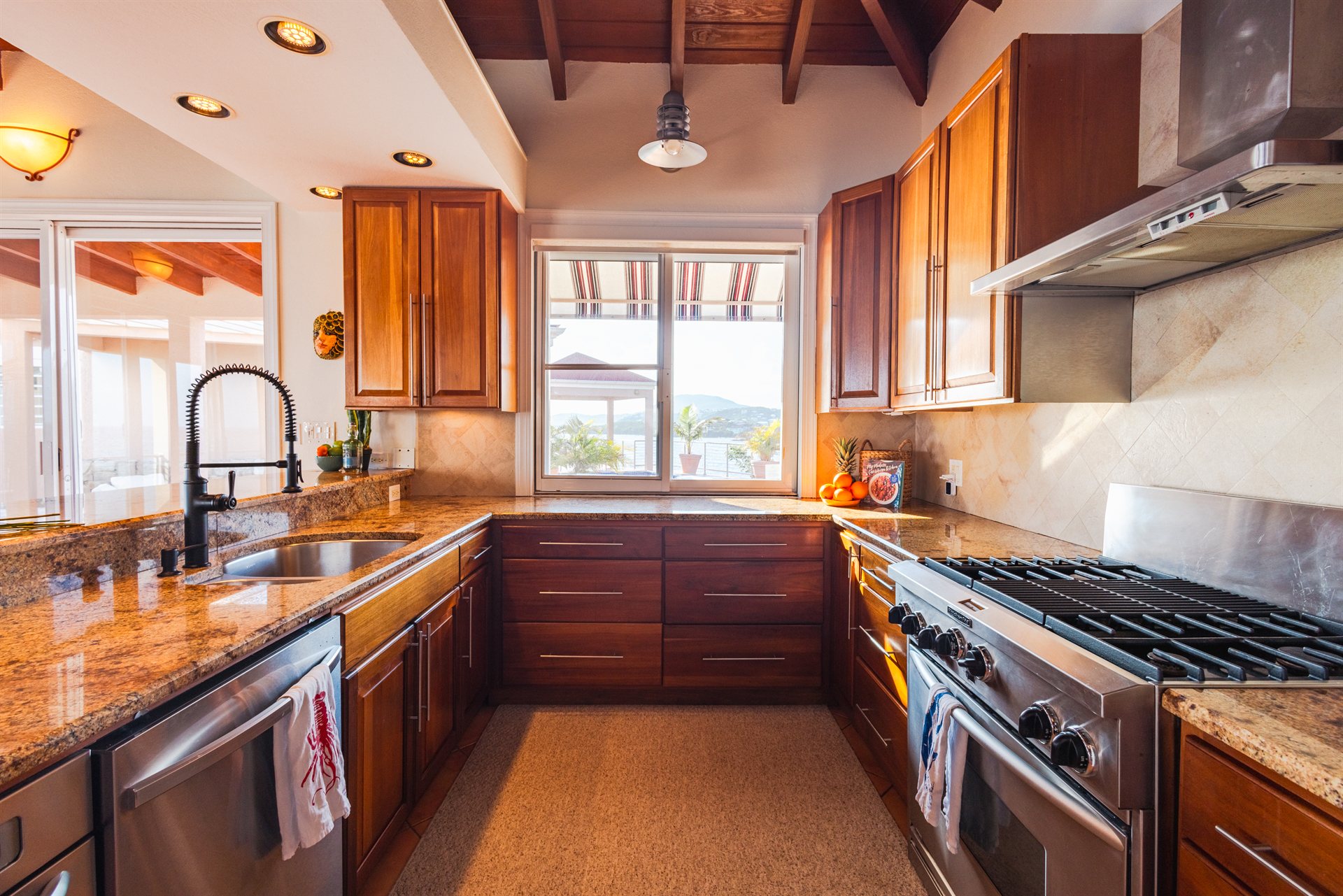 Gourmet professional kitchen with premium appliances at Ocean Pointe Caribe estate, USVI