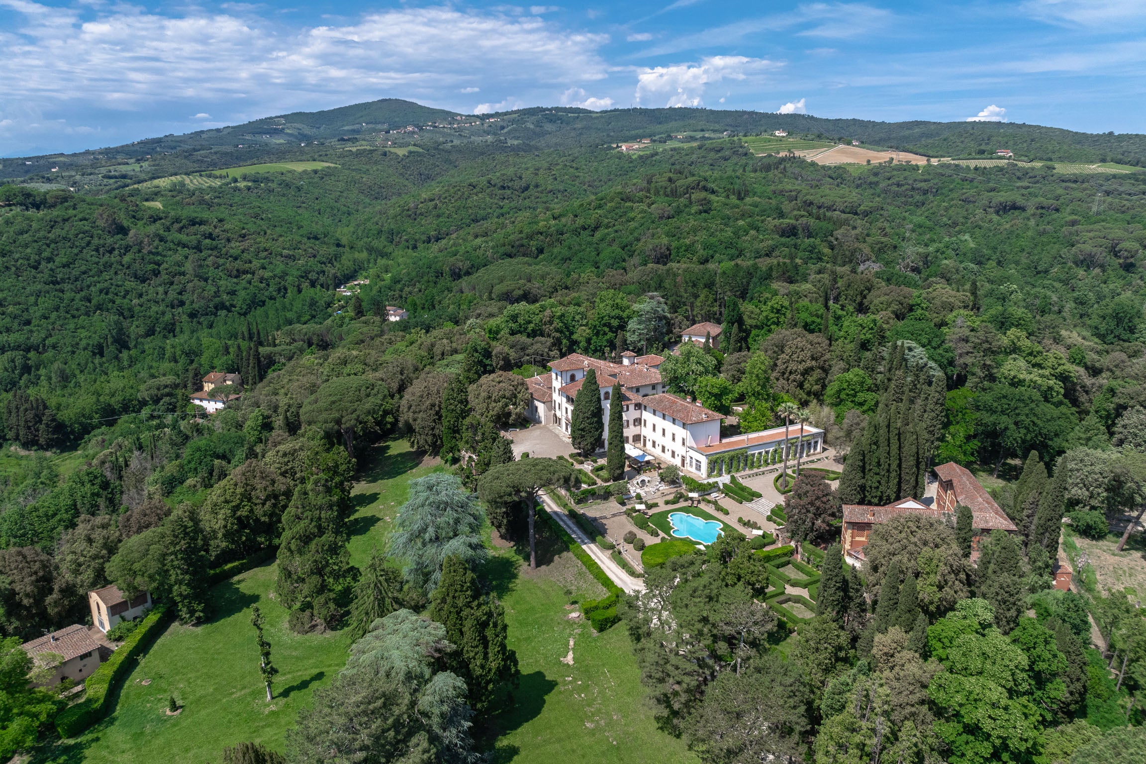 Pristine exterior view of the Villa Bibbiani historic estate in Tuscany, Italy